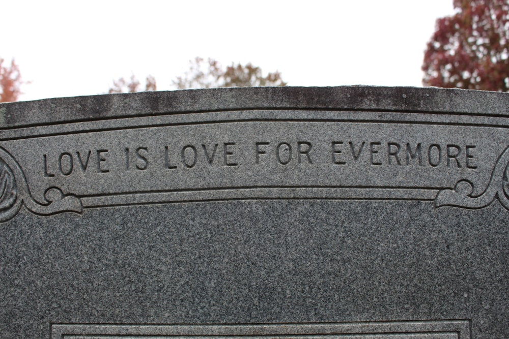 Cemetery headstone with flowers